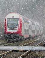 Steuerwagen 011 durchf�hrt w�hrend einer kr�ftige Schneeschauer die Ortschaft Enscherange.